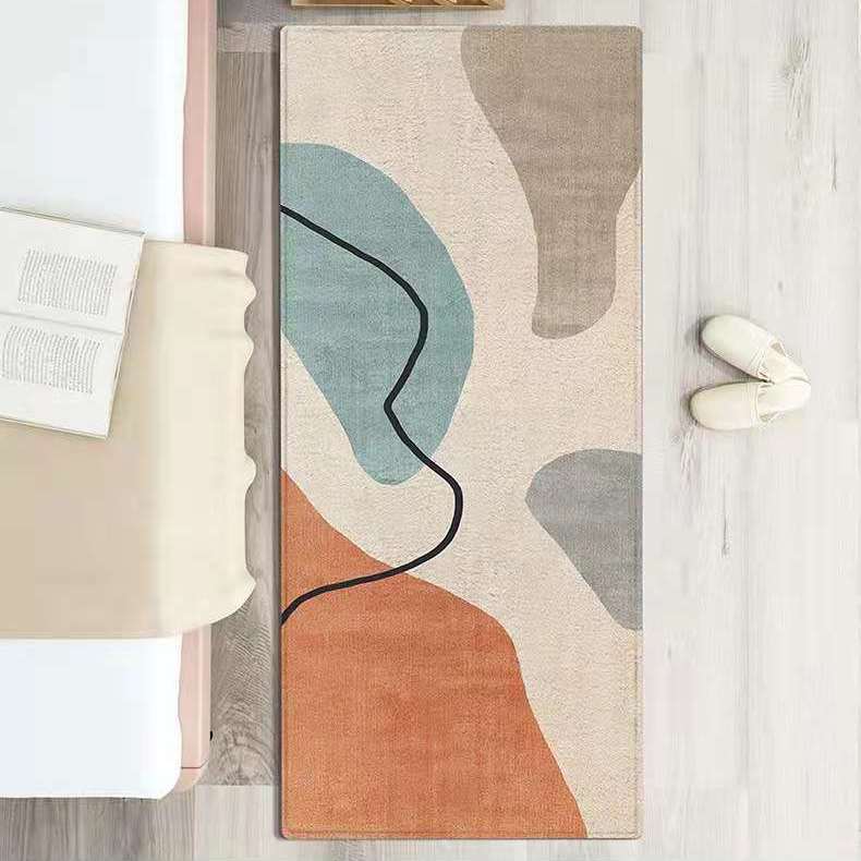 Rectangular Rug In Front Of Bed In Home Room